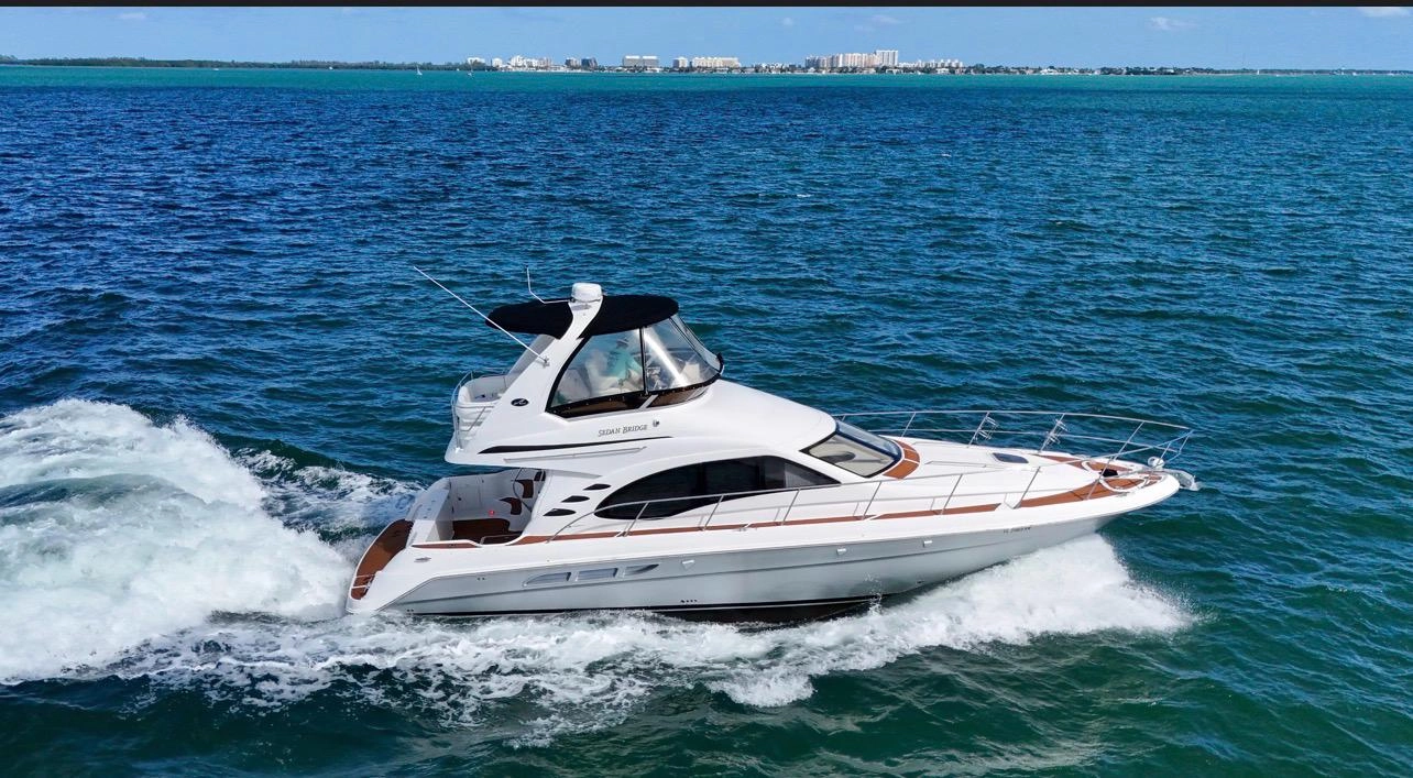 stunning searay sedan brige flybrige available for rental in Miami, FL
